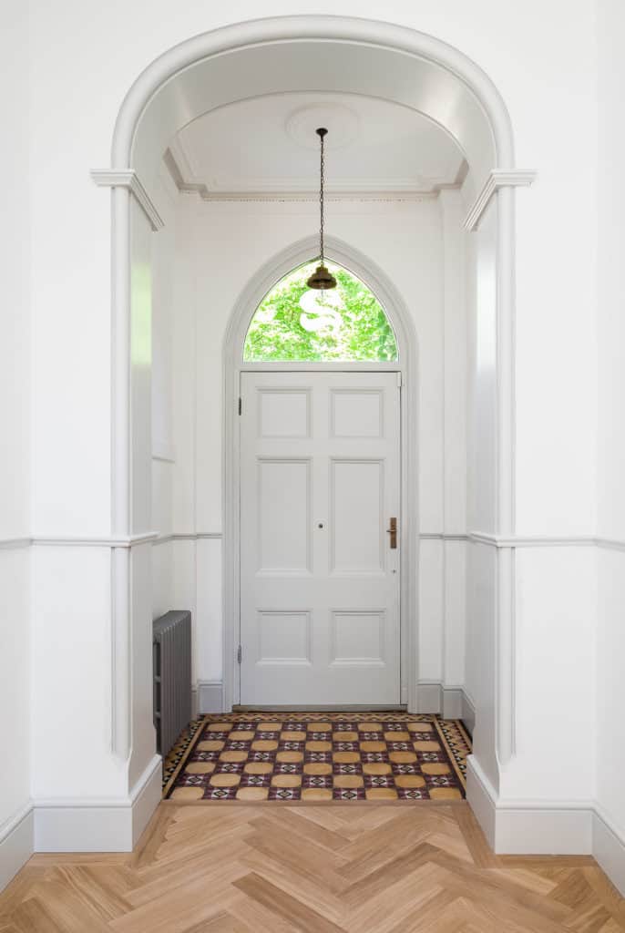 Restored period tiles in Victorian Kew refurbishment